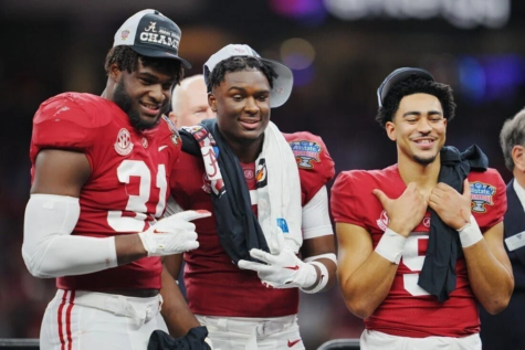 Alabama teammates Will Anderson Jr. (left) Jordan Battle (middle) and Bryce Young (Right) celebrate 2022 Sugar Bowl victory.