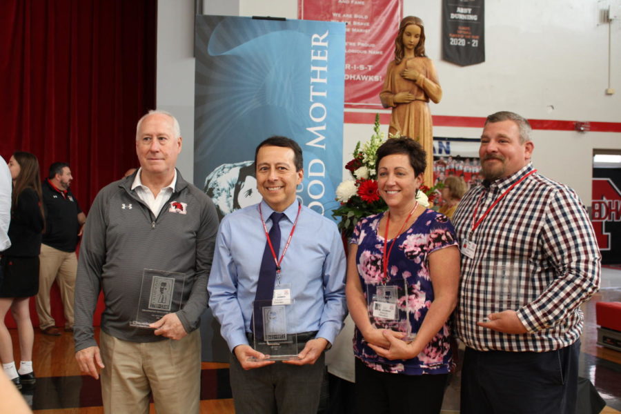 Br. Carey, Mr. Trevino, Ms. Sweeney, and Mr. Christensen each win the Champagnat Education Award.