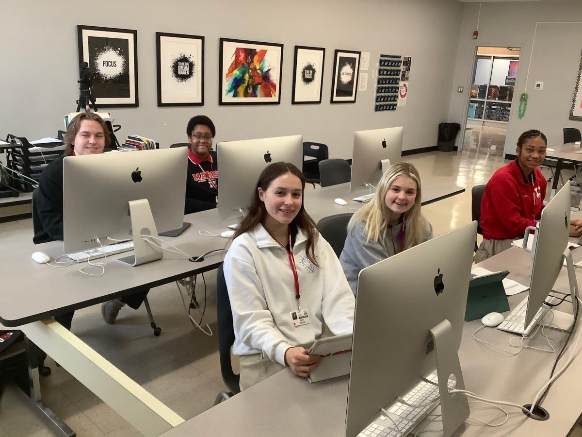Marist’s Journalism 2 class is hard at work in the computer center.