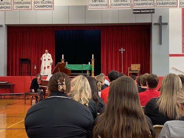 Father Hurley '85 presiding over the first mass of the school year