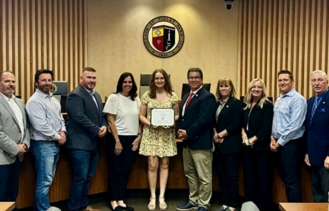 Celia Lindokken being highlighted and awarded for her perfect ACT score. (Credit- Marist Chicago Instagram)