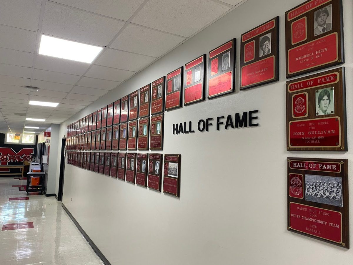 Plaques honoring Hall of Fame members line the hallway