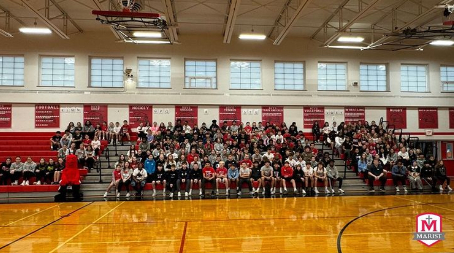 225 6th through 8th graders line the Marist gym during a recent shadow day (Credit: Marist Chicago Admissions Instagram)