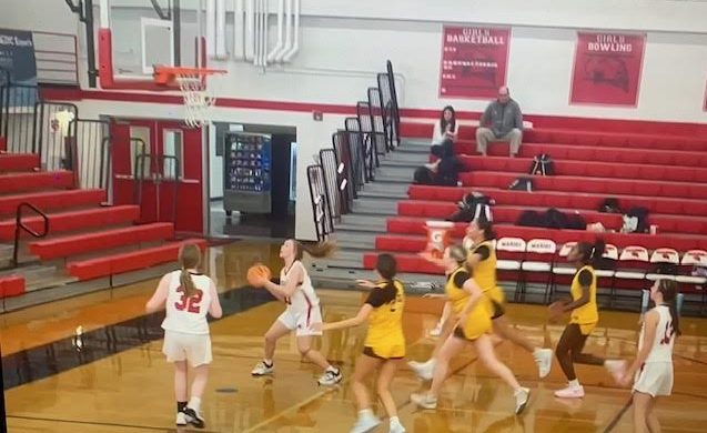 Girls JV basketball crushes Carmel in home conference