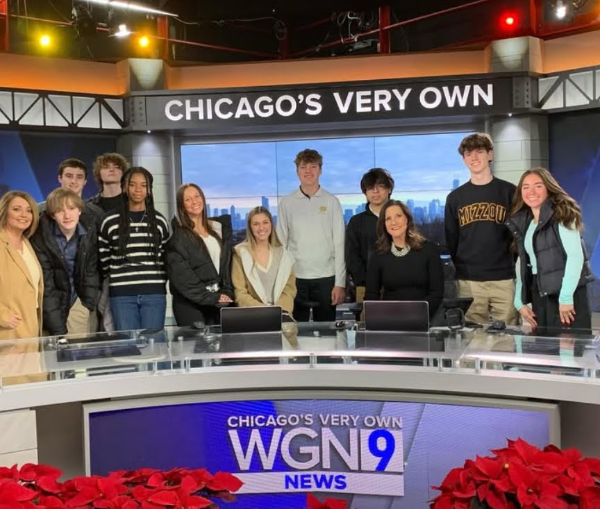 Broadcasting 2 and Journalism 2 students with WGN 9 News station anchor Dina Bair. 