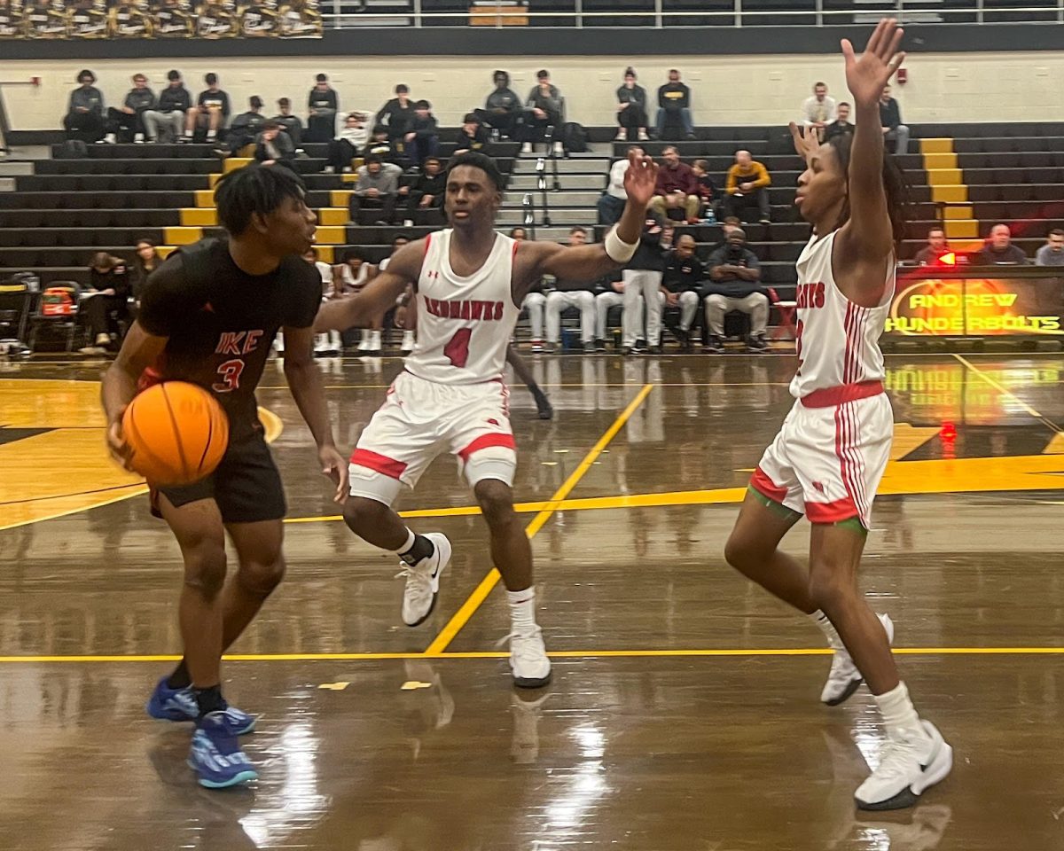 Junior Karson Thomas and Junior TJ Tate press an Eisenhower player after an inbound