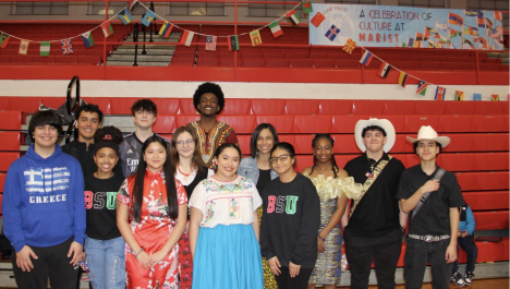 Ms. Hayes (center) surrounded by Marist students at the second annual Celebration of Culture (Credit: Marist Chicago website)