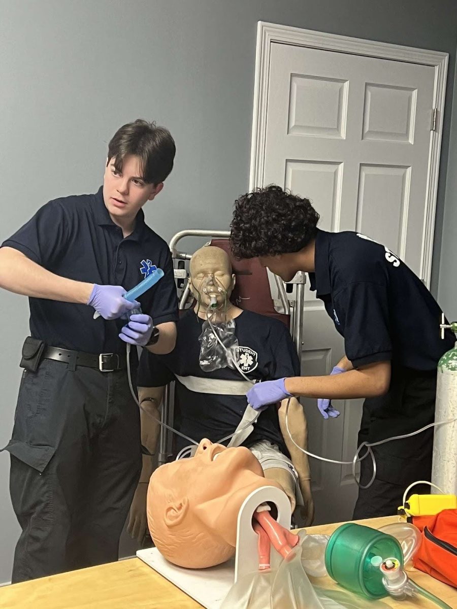 Student Timothy Graber getting hands-on training in the EMT course 