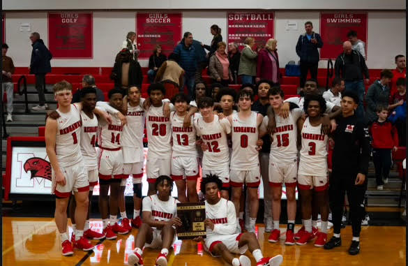 RedHawks posing with the regional championship plaque (Credit: Torres_viz on Instagram)

