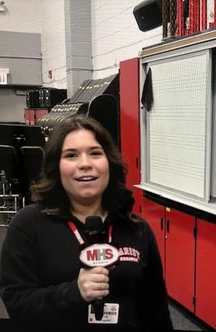 MHS News Reporter Erin Trapani interviews Mr. Creigh about the band's trip to Hawaii