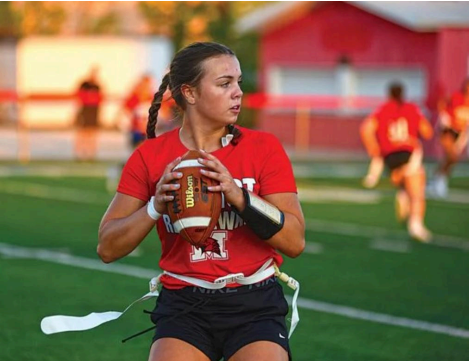 Quarterback Rylie O’Connor practicing before a game (Credit: Beverly Review)