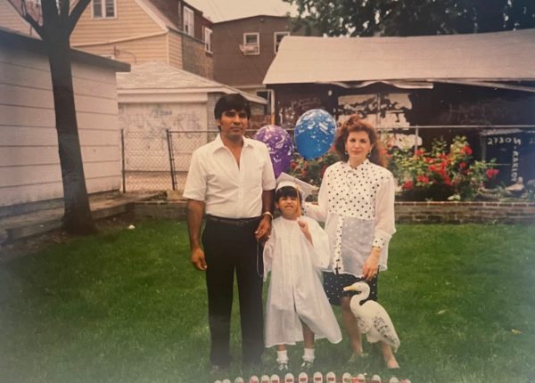 Macario Castellanos, Jennifer Castellanos, and Martha Castellanos (left to right) pictured in 1992 after Jennifer’s kindergarten graduation in their backyard
