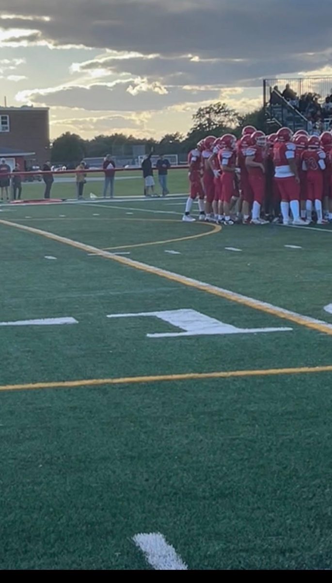 Sophomore team huddled up during a time-out