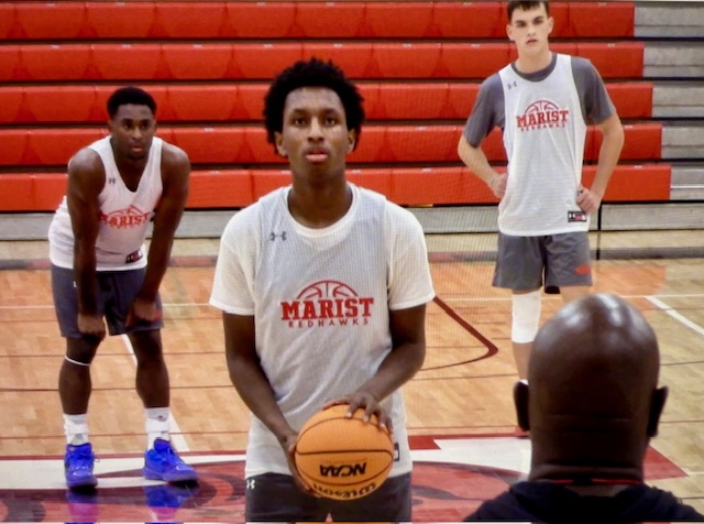 Transfer student Chuck Barnes practicing with his new teammates