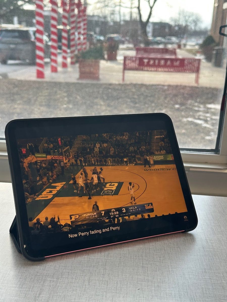 A student’s iPad playing a game between Purdue and UCLA
