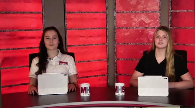 Claire Stokes and Melanie Koss anchoring the news