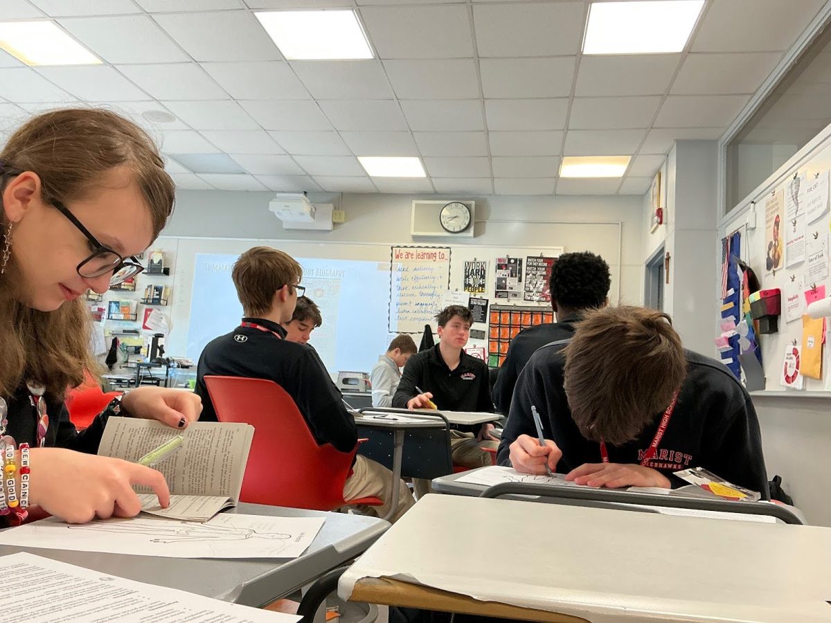 Students in Honors English I working during first period