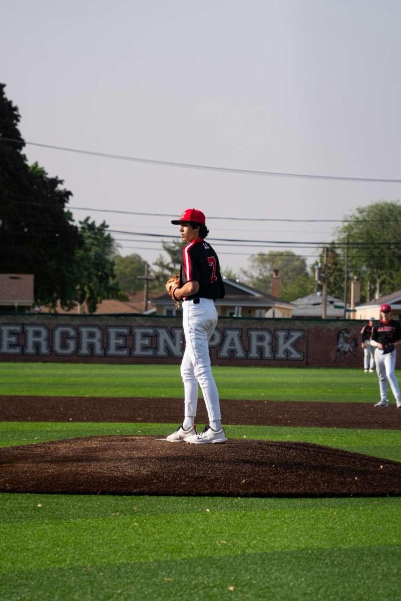 Senior Ryan Rosas on the mound for the RedHawks (photo credit: Pork.visuals)