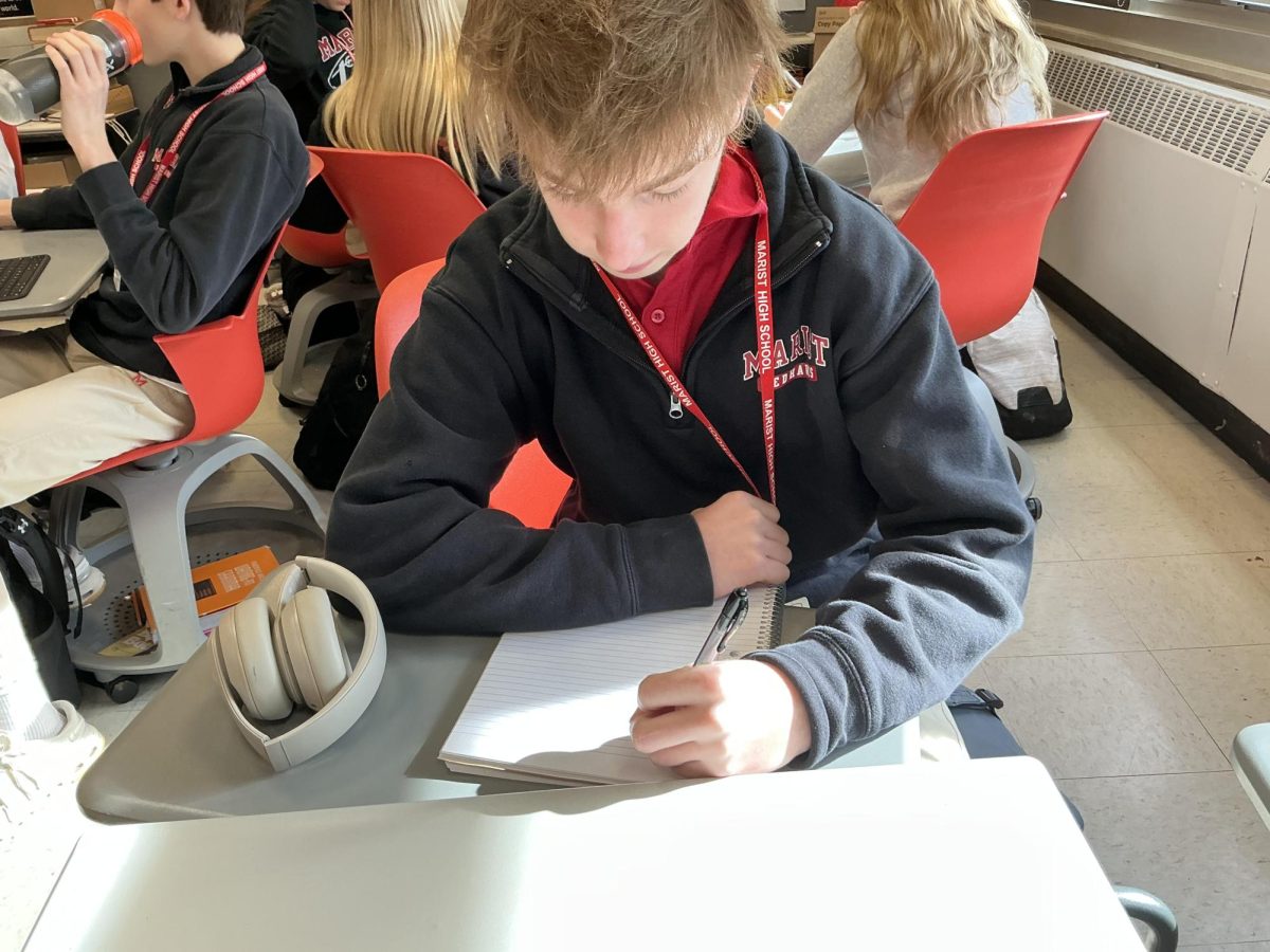 Freshman Brendan Bjork doing homework 