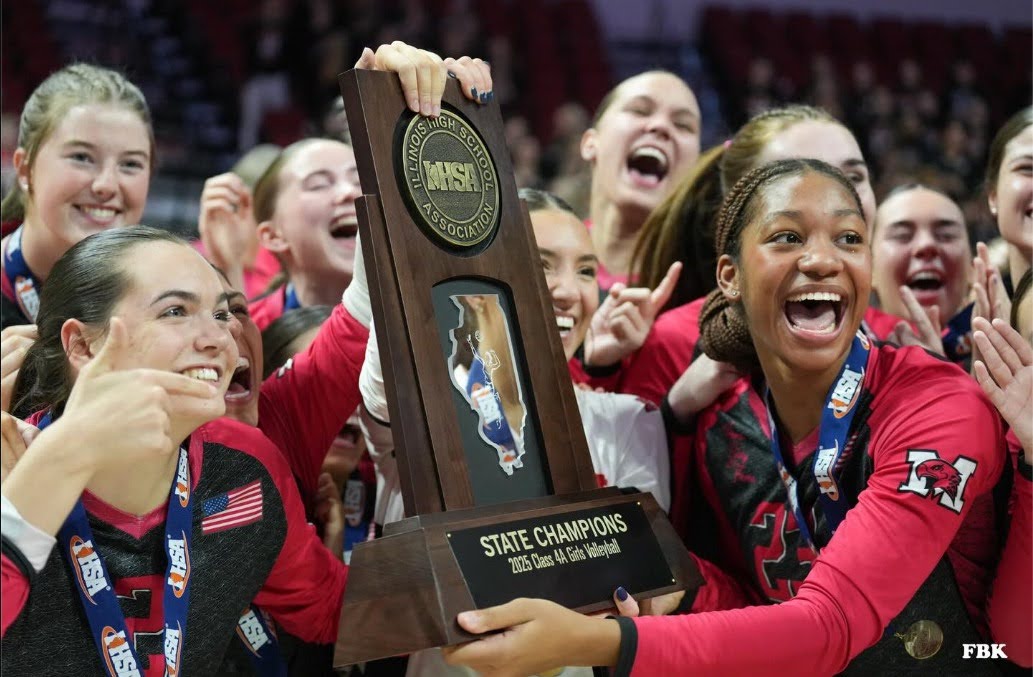 Members of the Marist girls volleyball team posing with their trophy (Credit: Flicksbykarm on Instagram)