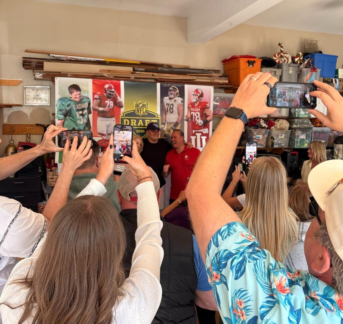 Family and friends erupting in cheers after Pat Coogan received a call from the Tennessee Titans
